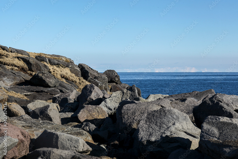 rocky coast of Atlantic ocean in Iceland. Large beautiful stones for the background rocky coast of Atlantic ocean in Iceland. Large beautiful stones for the background