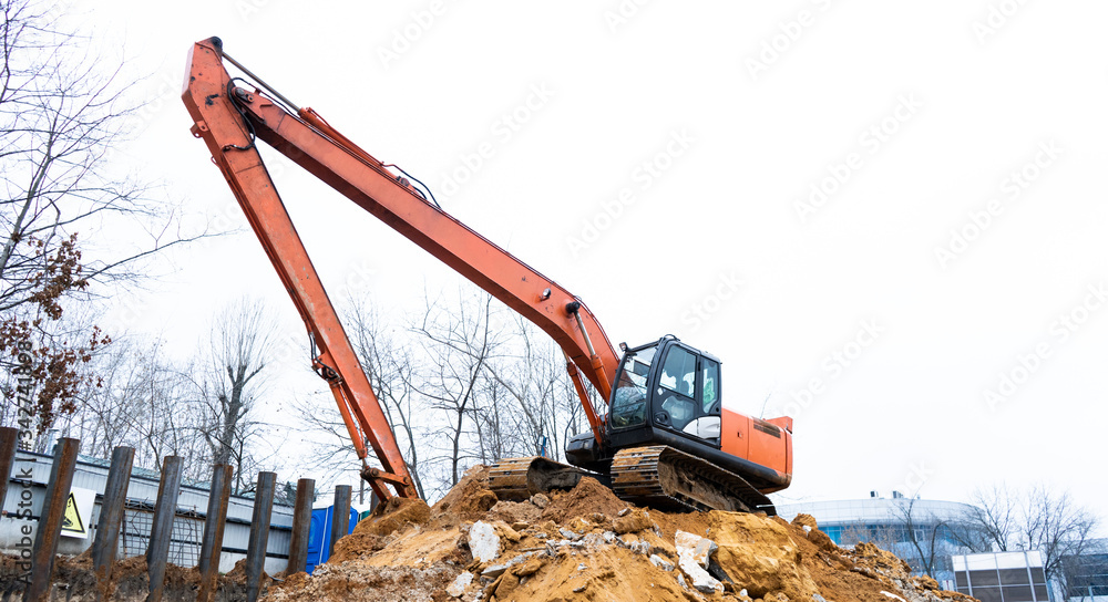 Construction, fittings, excavator, workers in suits, fastening fittings