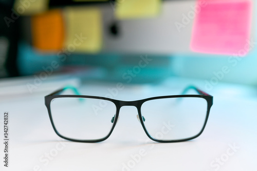 Wallpaper Mural Close up image of eyeglasses on the desk Torontodigital.ca