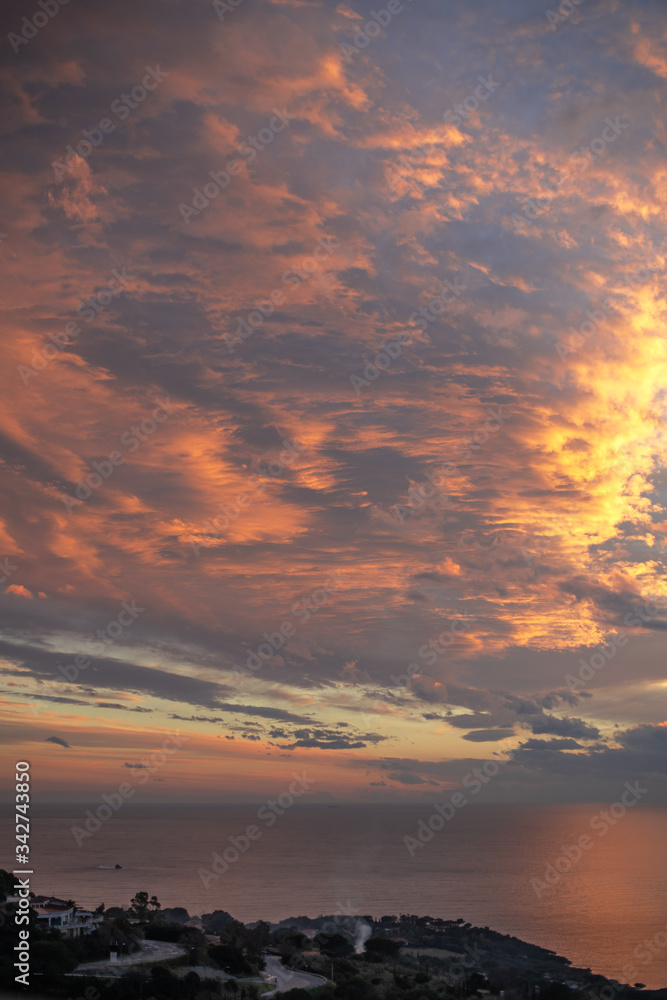 Fototapeta premium sunset elba island and clouds