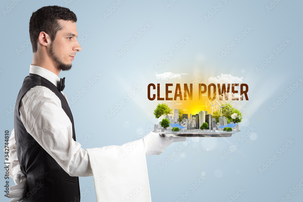 Waiter serving eco city with CLEAN POWER inscription, renewabke energy concept Waiter serving eco city with CLEAN POWER inscription, renewabke energy concept
