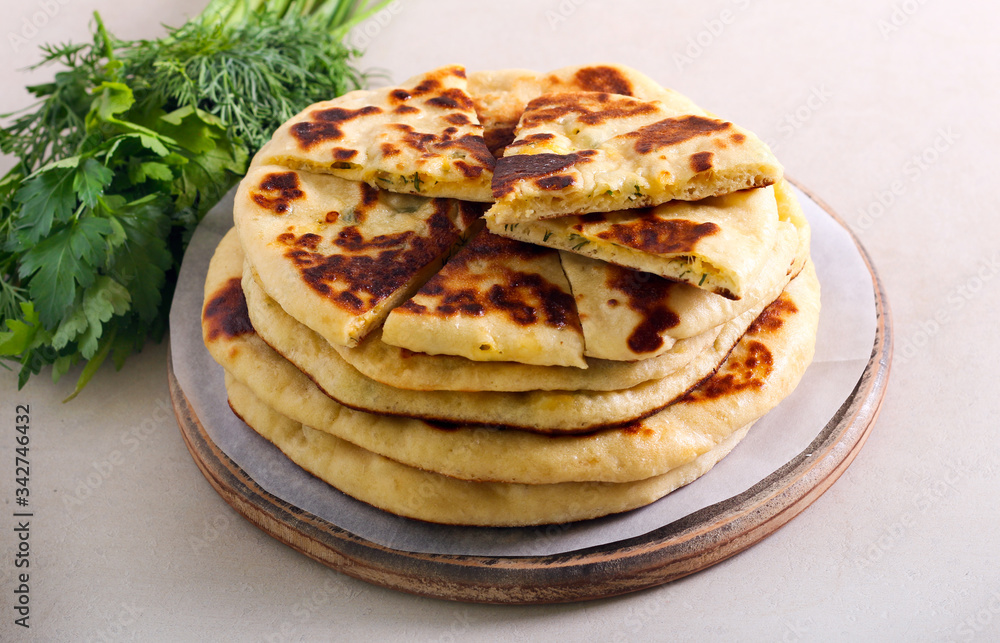 Flatbread with cheese and herb filling Flatbread with cheese and herb filling