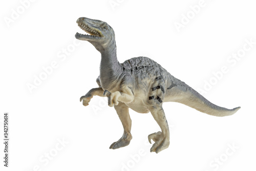 tyrannosaurus rex toy isolated on white © annmirren