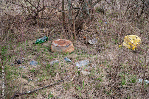 People illegally thrown garbage into the forest