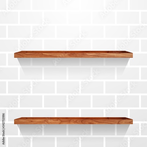 Two wooden shelfes on light brick wall. Abstract empty template.