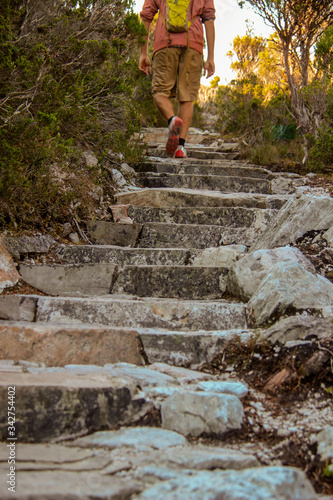 Hiking through sun drenched mountains