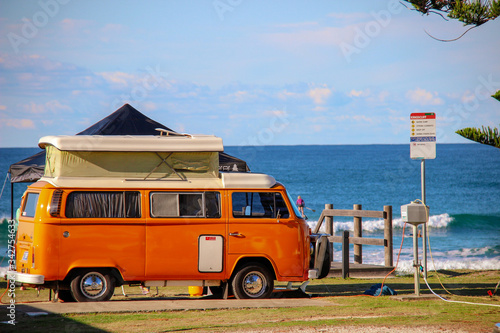 Old v w campervan parked in paradise