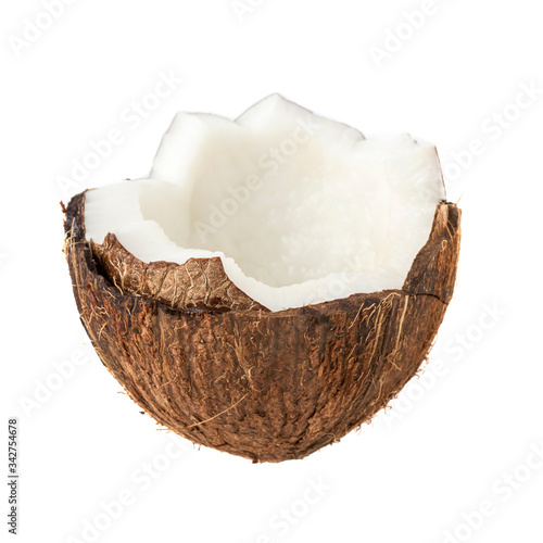 ripe coconut in a shell with open flesh and pieces on a white background isolate