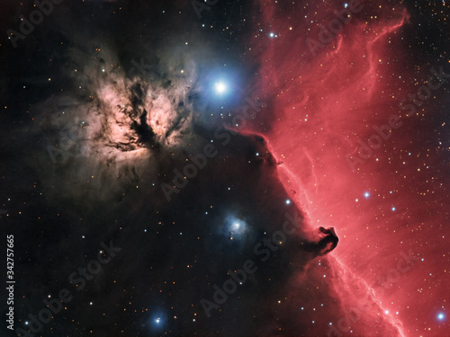 The Flame Nebula (NGC 2024) and Horsehead Nebula  (B33 against IC 434), beautiful emission and dark nebulas located near Alnitak, the easternmost star of Orion's Belt.  photo