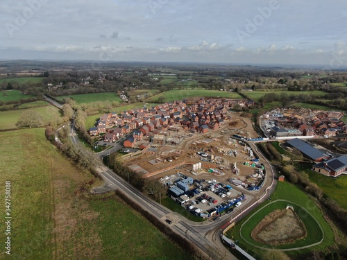aerial view new housing being built on the outskirts of Wimborne Minister in Dorset in the Uk