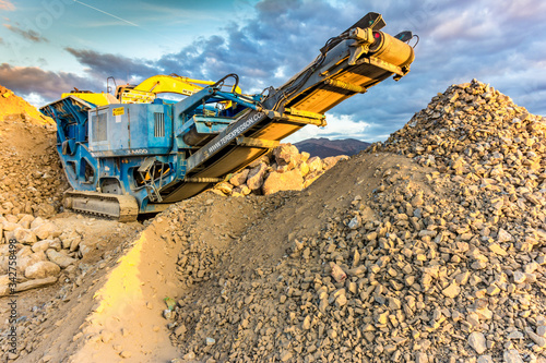 Stone crushing machine in a quarry or outdoor mine