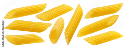 Raw italian penne rigate pasta isolated on white background photo