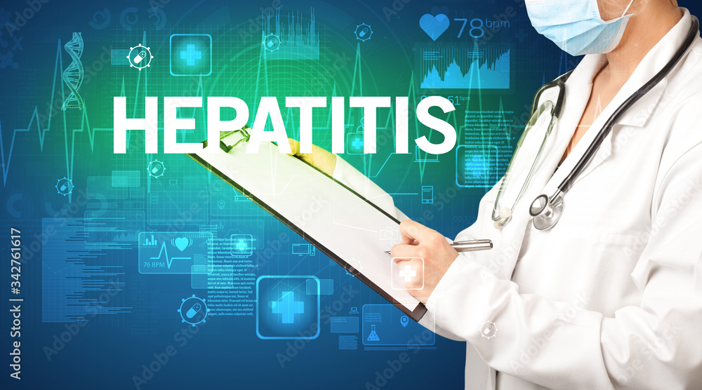 young doctor writing down notes with HEPATITIS inscription, healthcare concept young doctor writing down notes with HEPATITIS inscription, healthcare concept
