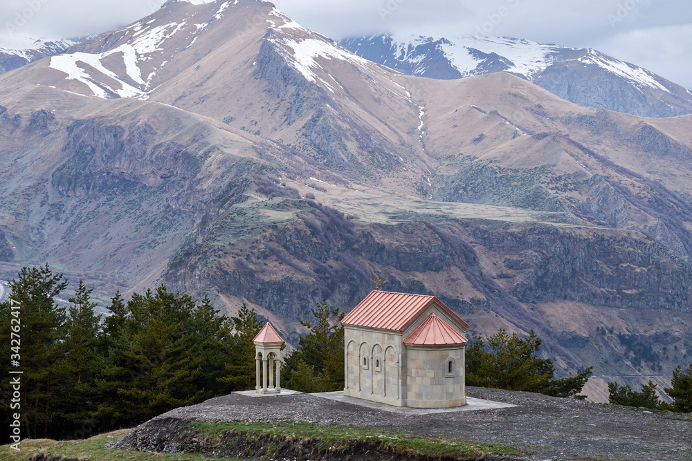 Beautiful scenery of Kazbegi valley view from Ioane Natlismcemeli church, Caucasus mountain range in Georgia
