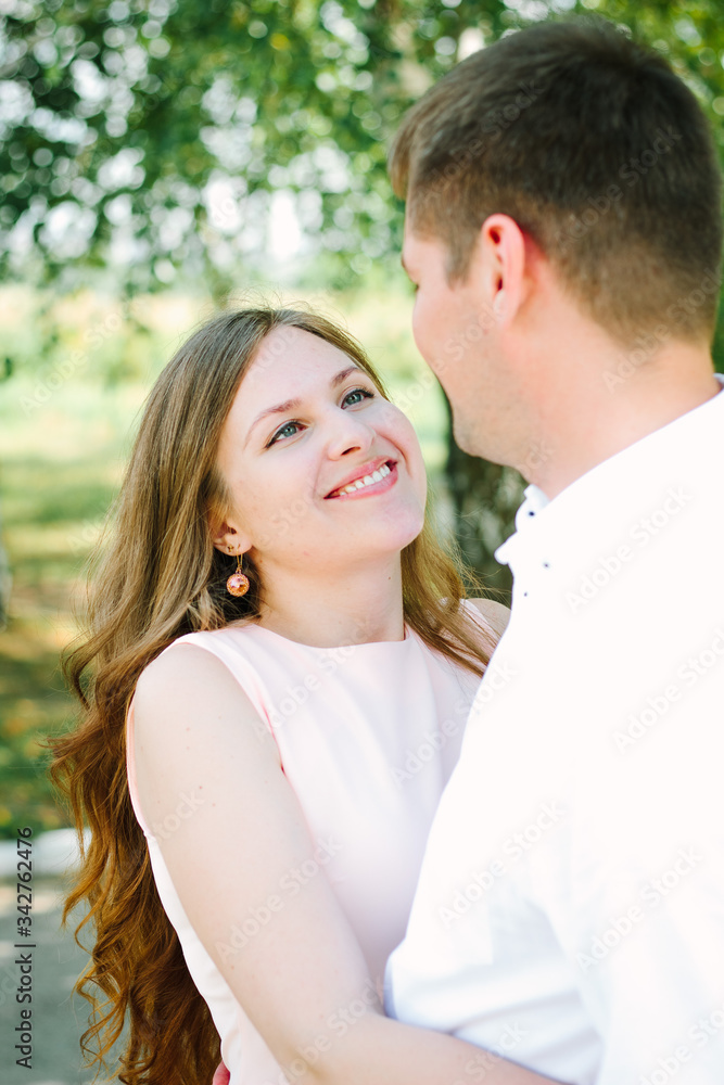 Young lovely couple at a nature park Young lovely couple at a nature park