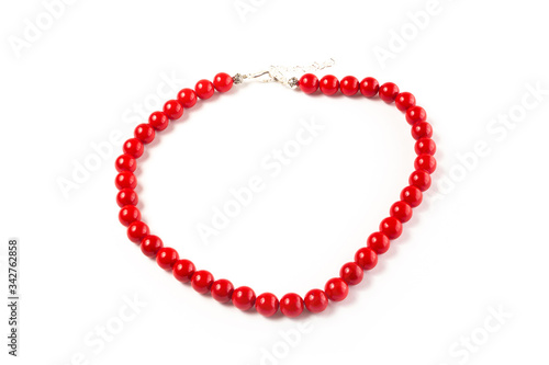 natural coral beads on a white background isolate