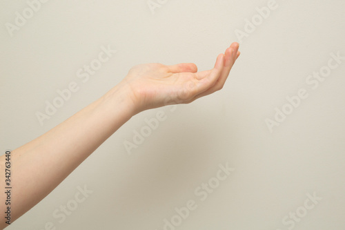 Woman hand on white background