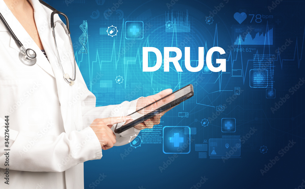 young doctor writing down notes with DRUG inscription, healthcare concept young doctor writing down notes with DRUG inscription, healthcare concept