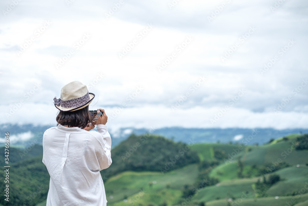 A resort beside rice fields and mountains during the rainy season in Mae La Noi District, Mae Hong Son Province of Thailand. A resort beside rice fields and mountains during the rainy season in Mae La Noi District, Mae Hong Son Province of Thailand.