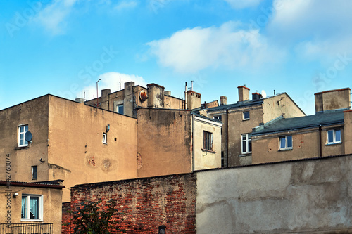 Chimneys and walls of marked residential houses in the city of Gniezno in Poland.