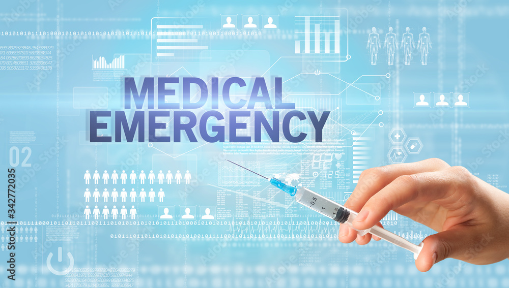 Close-up view of doctor's hand in a white glove holding syringe with MEDICAL EMERGENCY inscription, healthcare and medical concept Close-up view of doctor's hand in a white glove holding syringe with MEDICAL EMERGENCY inscription, healthcare and medical concept