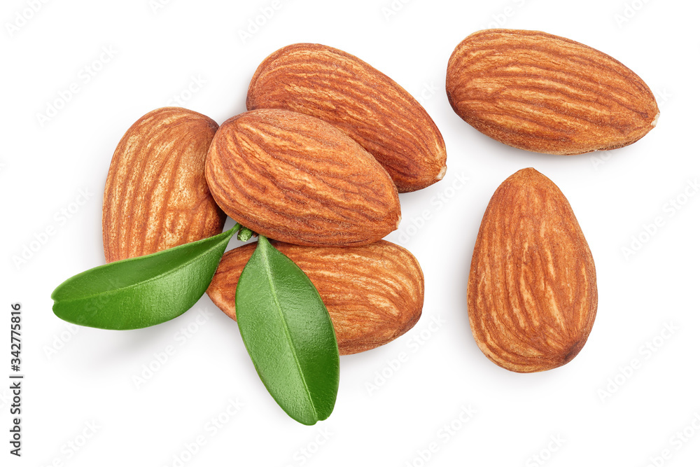 Almonds nuts with leaves isolated on white background with clipping path and full depth of field. Top view. Flat lay. Almonds nuts with leaves isolated on white background with clipping path and full depth of field. Top view. Flat lay.