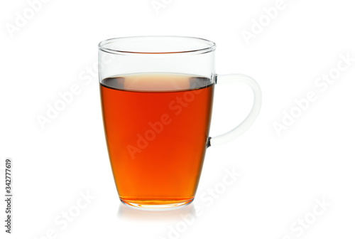 Tea in glass cup isolated on a white background.