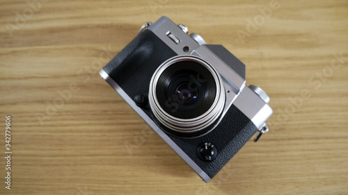 Silver vintage camera with modern features