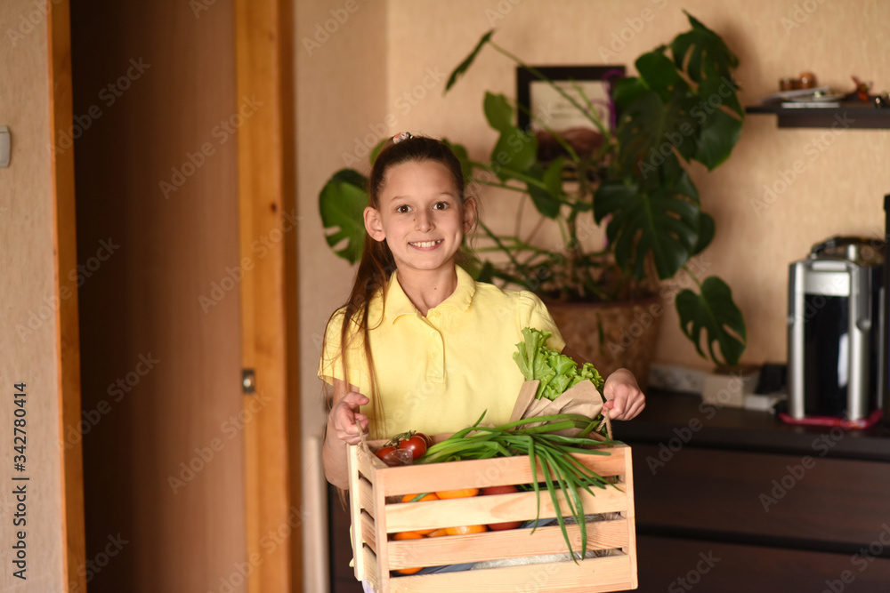 woman with vegetables in kitchen woman with vegetables in kitchen