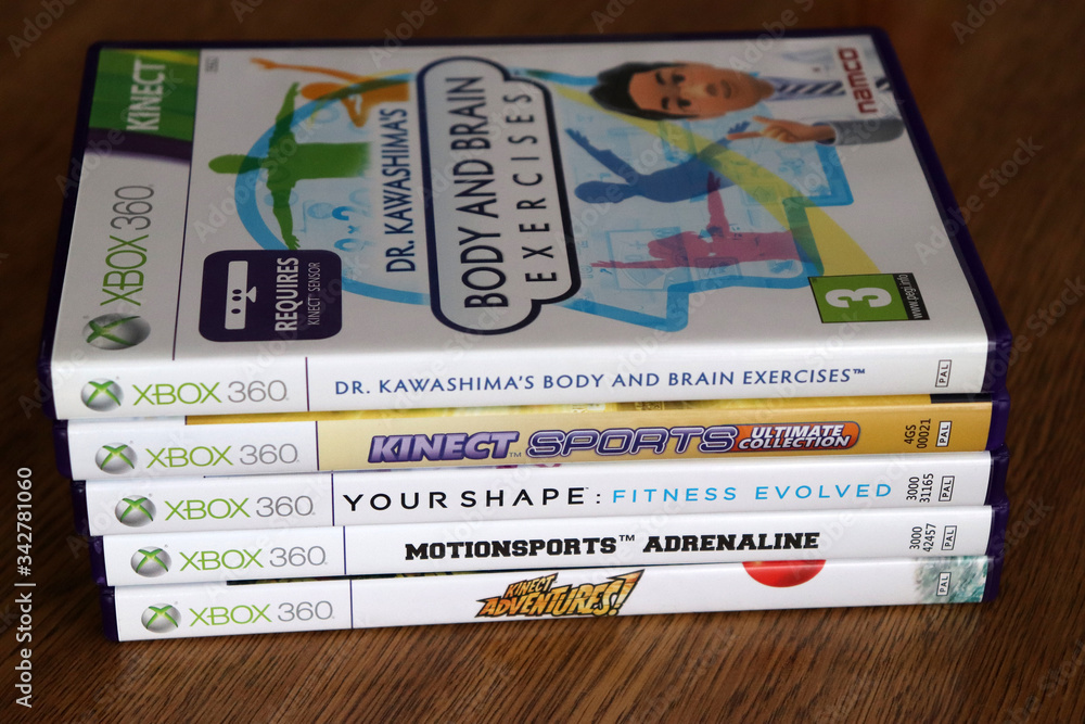 A stack of Kinect video games. The Kinect is a motion tracking sensor  accessory for the Microsoft Xbox 360 home video game console. Stock Photo |  Adobe Stock