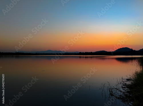 Sunset over the reservoir in Thailand