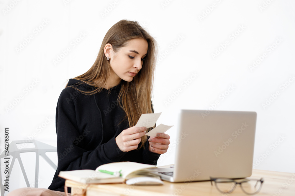 Smart young woman happy with language learning during online courses using a netbook, smiling student with a notebook