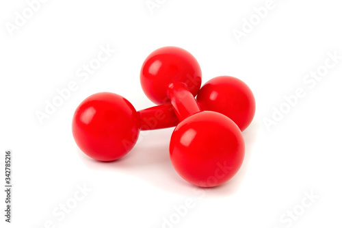 bright red sports dumbbells isolated on a white background
