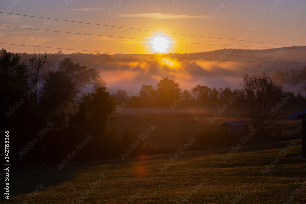 foggy sunrise