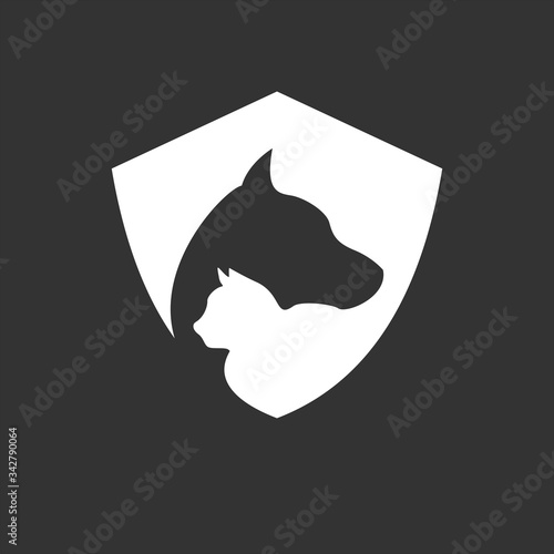 animal protection using cat and dog silhouette in shield vector illustration design