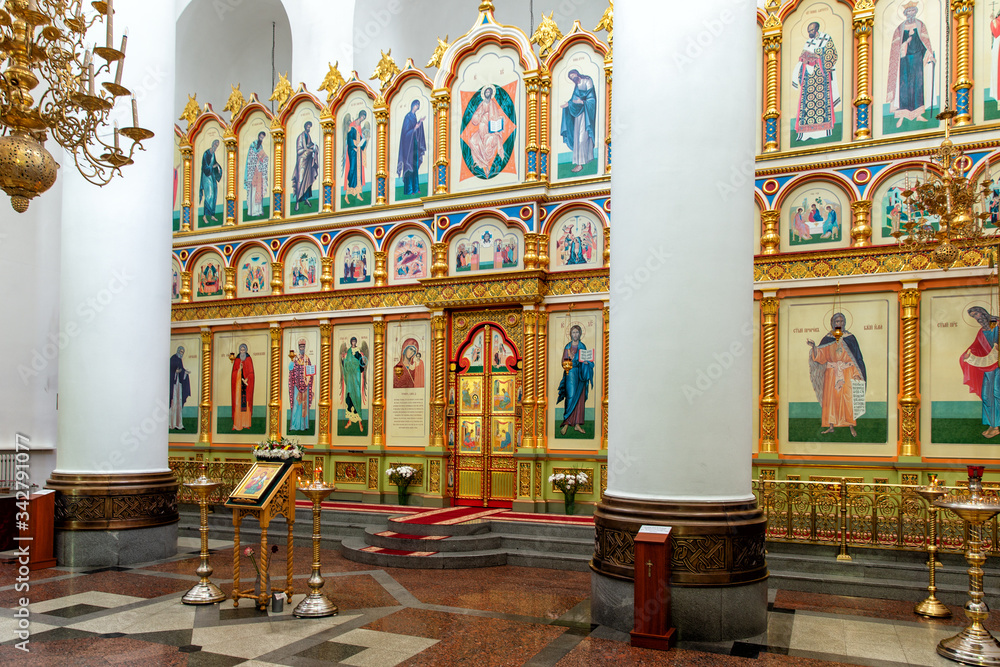 Altar and icons depicting saints in the Orthodox Cathedral. Temple in the name of the Transfiguration