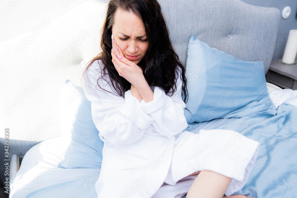 Photo of a woman with toothache. Acute toothache close up. Photo of a woman with toothache. Acute toothache close up.