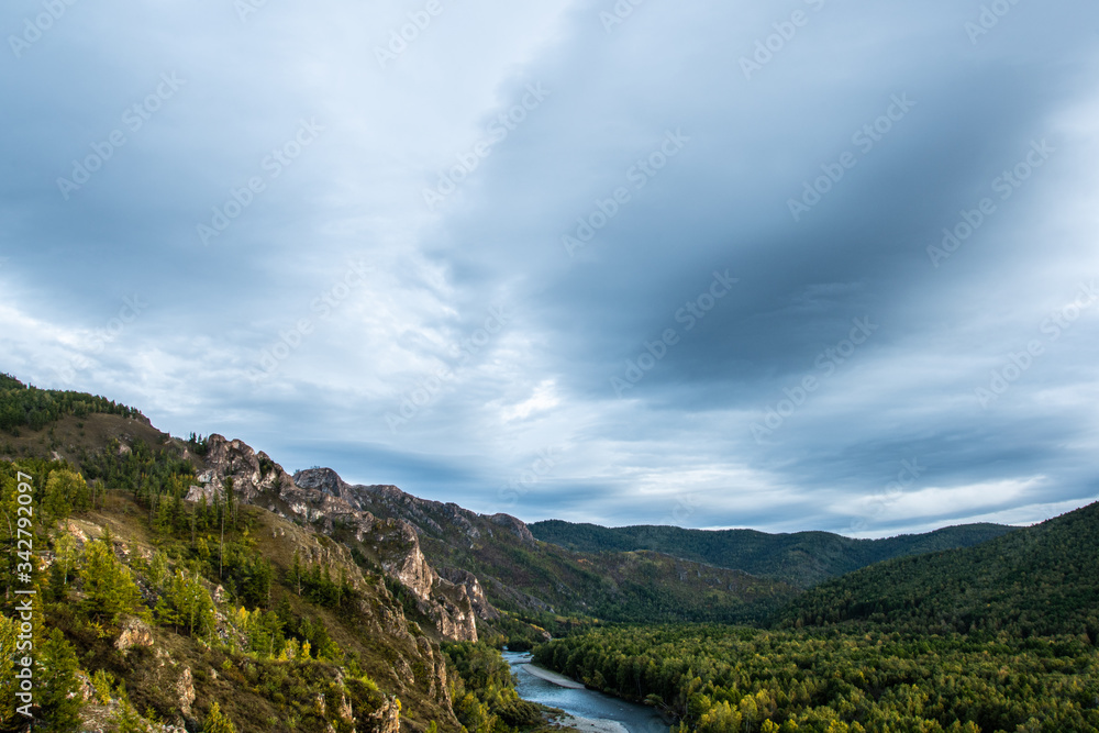 bend of riverbed among green forest, river valley bend of riverbed among green forest, river valley