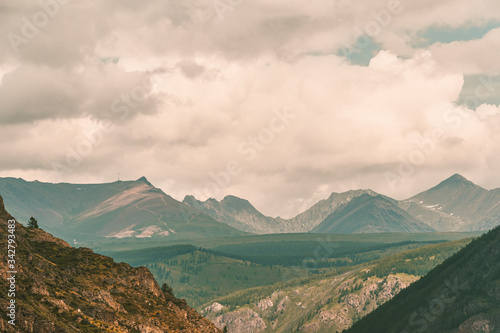 rocky mountains on horizon  valley for hiking and tourism