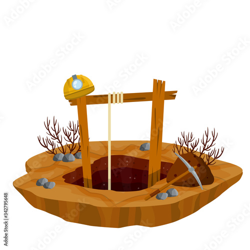 Mine. Hole in ground, rocks, pickaxe, miner's helmet. Extraction of minerals. Industrial concept. Old lifting mechanism