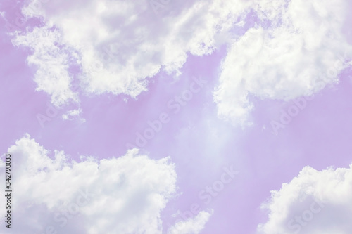 Fluffy white clouds on a pink background float in the sky. Dream. Femininity. Divine view. Background. Wallpaper. Concept passivity, passiveness, inactivity, inaction, passive.