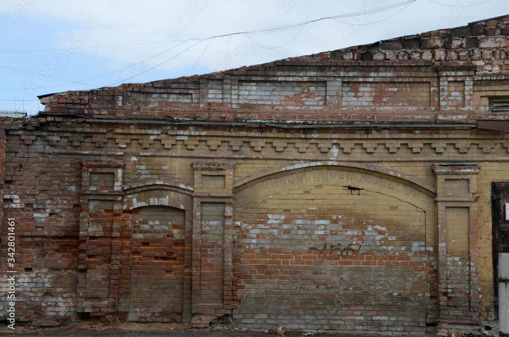 Wall of an old brick building.