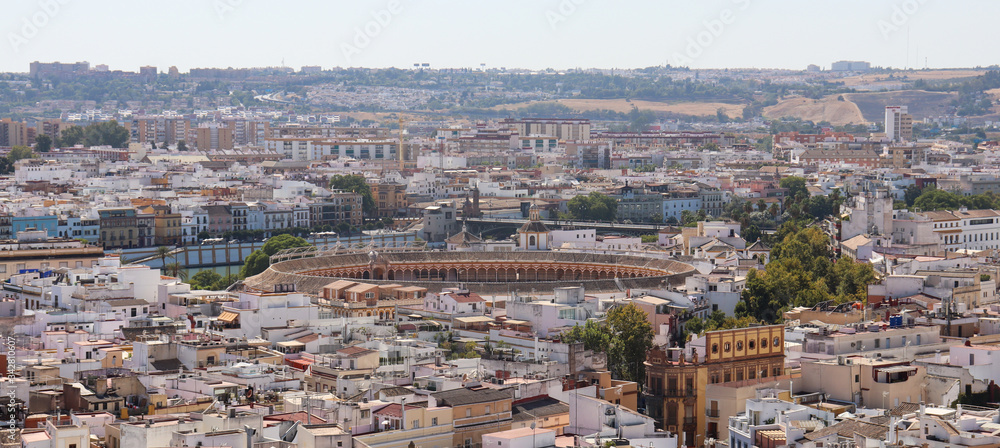 aerial view towards the grand royal bullring and historical buildings - Seville aerial view towards the grand royal bullring and historical buildings - Seville