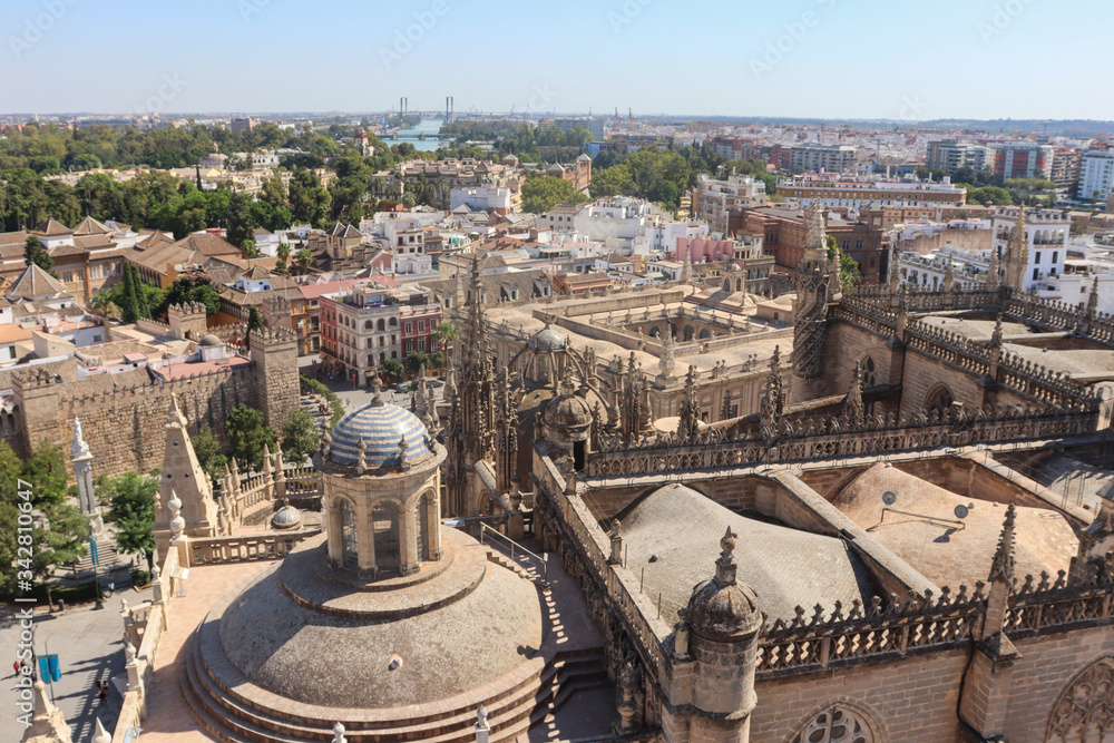 A wonderful aerial view across the roof, domes and spires of the Seville Cathedral. Andalusia, Spain.