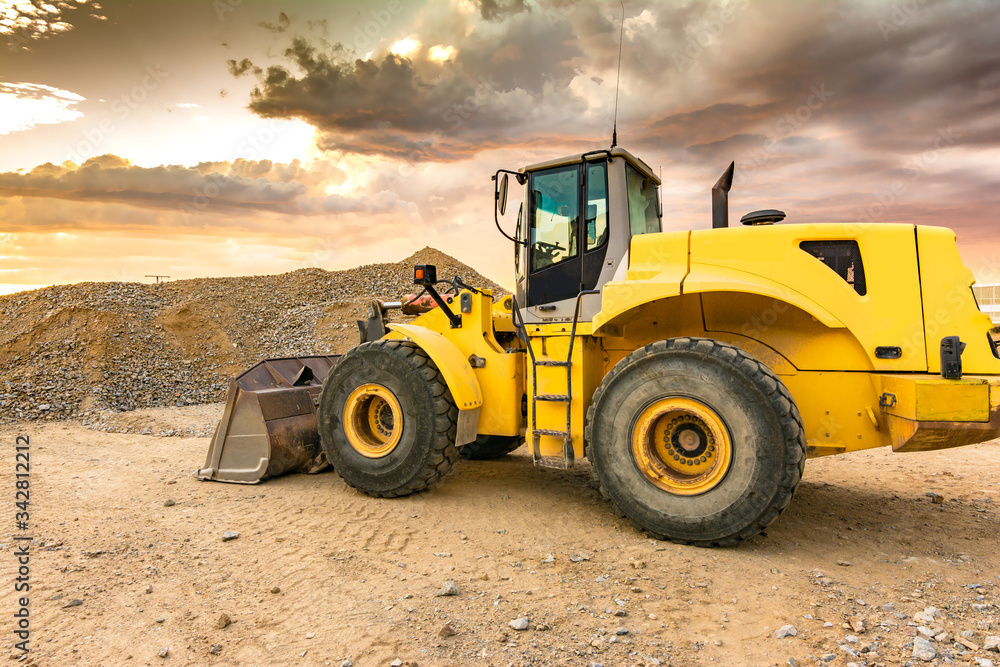 Earthworks with an excavator for the construction of a road Earthworks with an excavator for the construction of a road