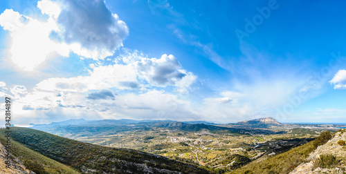 Beautiful scenic panoramic mountain views in Spain and buildings in Cumbre del Sol © bodiaphoto