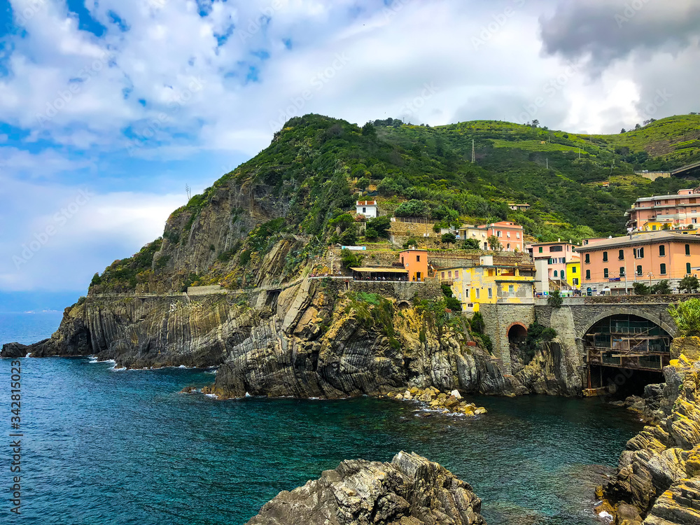 Beautiful scenic view of Mediterranean sea and fishing villages, visible from the hiking Cinque Terre trail from Vernazza to Monterosso al Mare in Italy, Europe.