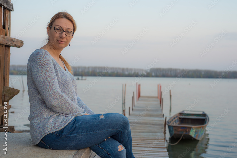 A woman by the Marina on the Danube in Dubovac.