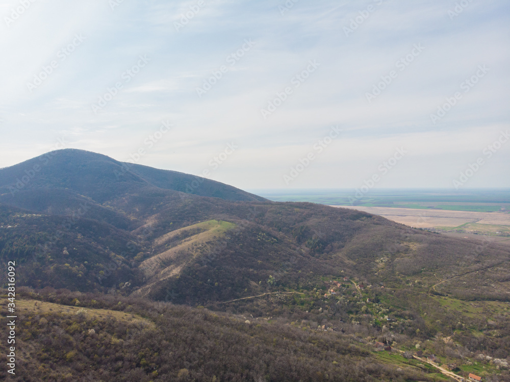 The concept of healthy air and healthy living. Aerial photography. Forest on the downhill of the mountain.