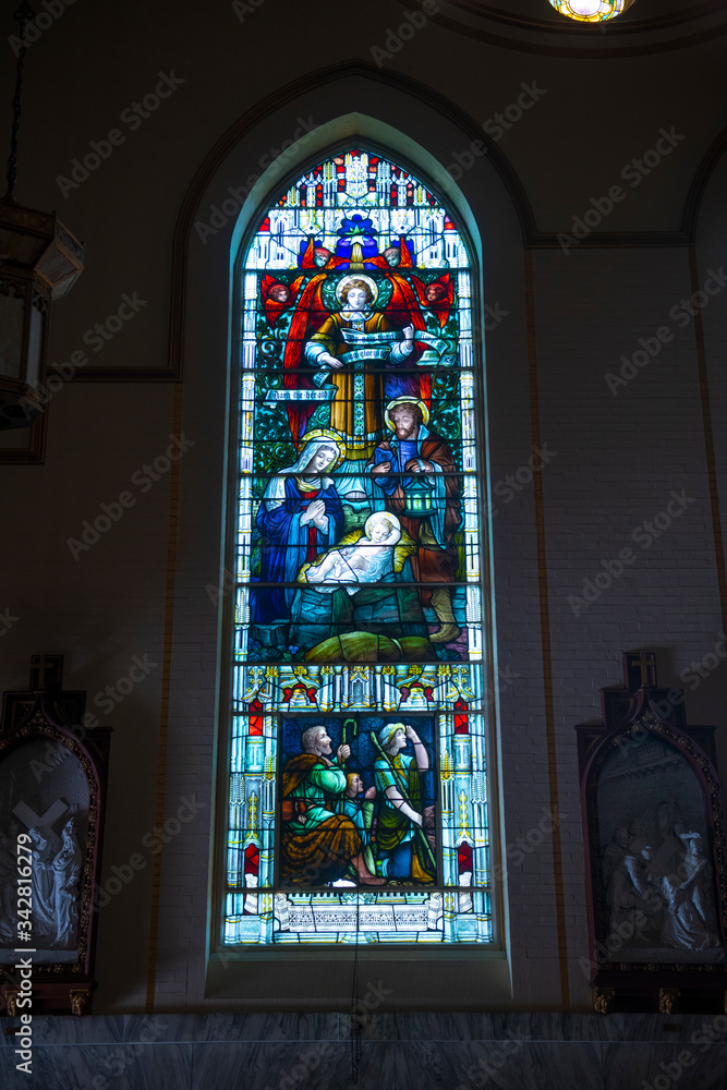 Stained glass of Saint Mary of the Assumption Parish Church at 5 Linden Pl at Harvard Street in Brookline Village, town of Brookline, Massachusetts MA, USA. 